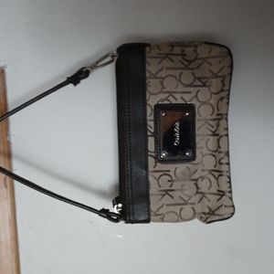CALVIN KLEIN  glutch purse.  Gently worn. 7" x 4.5".